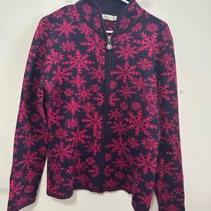 Neve Maya full-zip sweater with a snowflake pattern in pink and dark blue